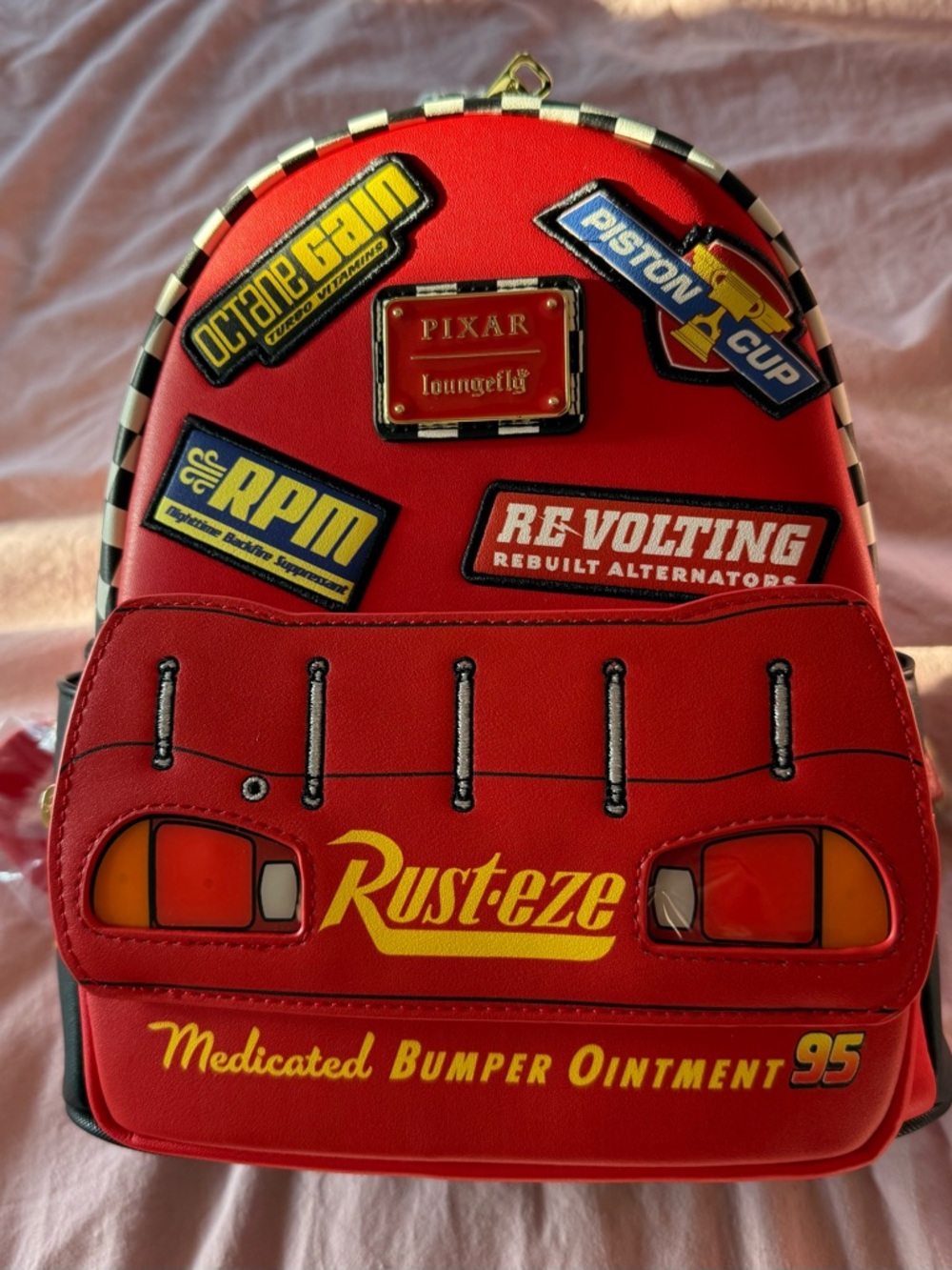 Loungefly Pixar Rust Eze Backpack